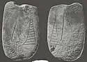 Celt shaped decorated pipe