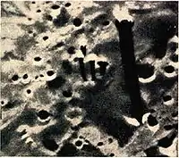 Photograph taken by Lunar Orbiter 2 on November 20, 1966, 29 miles (47&nbsp;km) above the lunar surface, over the Sea of Tranquility.