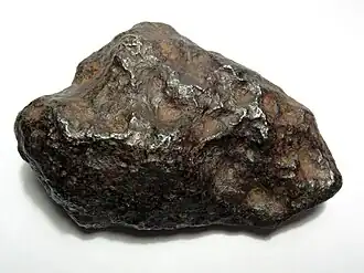 A 700-gram (25&nbsp;oz) individual Chinga iron meteorite (Ataxite, class IVB).[23] This specimen is about 9 centimeters wide.