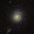I Zwicky 32, a face-on spiral galaxy in the constellation of Canes Venatici