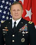 William C. Mayville Jr.[10][a]