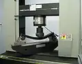 Test fixture on universal testing machine for three-point flex test