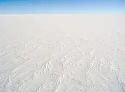 aerial view of ice sheet covered in snow Antarctica