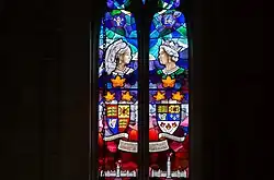Stained glass window with commemorative art of the Diamond Jubilees of Queens Victoria and Elizabeth II