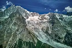 glacier flowing steeply downhill from Mont Blanc