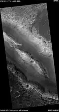 Her Desher Vallis, as seen by HiRISE. Her Desher Vallis is found in the Coprates quadrangle.