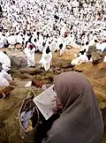 Pilgrims supplicating on the Mount of Mercy in Arafat during Ḥajj (the Greater Islamic Pilgrimage)