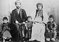 Christian family from Ramallah wearing typical Palestinian Ottoman-period clothing, c. 1905