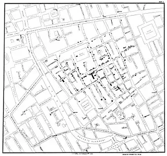 A black and white map John Snow's cholera map of the 1854 Broad Street cholera outbreak, with houses of infected people marked in black.
