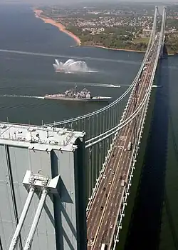 The Verrazzano-Narrows Bridge, shown with the United States Navy warship USS&nbsp;Leyte Gulf (CG-55) passing underneath it, spans The Narrows