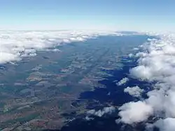 A wave window over the Bald Eagle Valley looking north from Port Matilda. The Allegheny Front, which forms the wave, is under the left edge of the window.