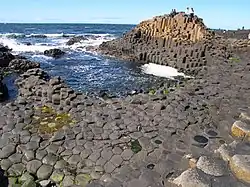 Cooled basalt at Giant's Causeway. Vertical mainly 120° cracks giving hexagonal columns