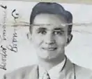 A black and white photo of a man