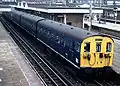 A Class 501 EMU in Rail Blue calling at Harrow and Wealdstone