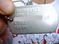 Air Force ID tag (serial number blurred), modern, designation: pagan