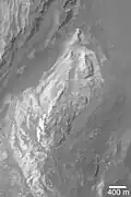 Light toned sedimentary outcrops on the floor of Juventae Chasma.