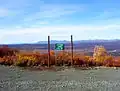 At 4,086 feet (1,245&nbsp;m), Maclaren Summit is the highest point on the highway.