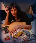 In the 1990s crime and spy comedy films were extremely popular like Pulp Fiction (depicted), L.A. Confidential, New Jack City, Boyz n the Hood, Menace II Society, Goodfellas, and the Austin Powers film series.