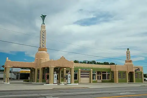 The U-Drop Inn, a roadside gas station and diner on U.S. Highway 66 in Shamrock, Texas (1936)