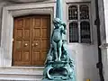 Another view of the bronze lamp standard on the right of the stairs.