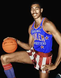 Hall of Fame basketball player Wilt Chamberlain (did not graduate)[85]